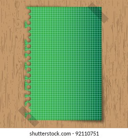 New  sticky green paper graph on wooden board.