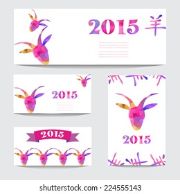 New Year 2015 cards set with goat heads made by colorful geometric triangles. Chinese astrological sign. New year background, invitation, greeting card, design element. Chinese calligraphy.