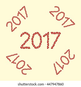 New Year 2017 made from hearts on yellow background