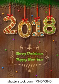 New Year 2018 in shape of gingerbread against wood background. Year number like cookies on ribbon