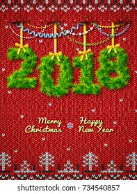 New Year 2018 of twigs as christmas decoration. Holiday congratulation against knitted background