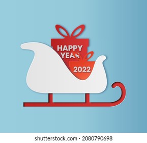 New Year 2022 and Winter in paper cut style. New Year's box and sleigh on blue background. Modern and trendy design