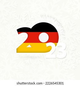 Neujahr 2023 für Deutschland auf Schneeflocken-Hintergrund. Gruß Deutschland mit dem neuen Jahr 2023.