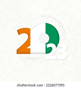 New Year 2023 for Ivory Coast on snowflake background. Greeting Ivory Coast with new 2023 year.