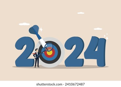 New year 2024 business strategy planning, financial targets for calendar year concept, businessman leader analyzing 2024 using magnifying glass.
