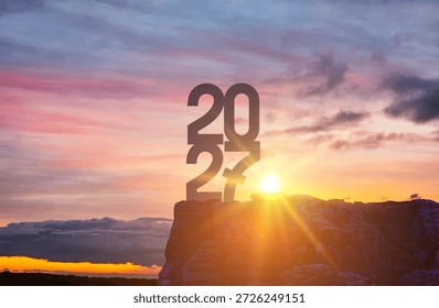 New Year 2027 at sunset concept. Silhouette of 2027 standing on a mountain with sunrise sun rays. Creative vector 2027 symbolizing new beginnings, goals, hope, future planning and success.