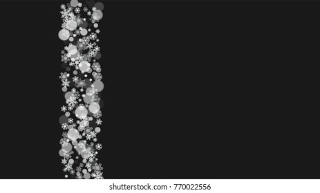 New year background with white frosty snowflakes. Horizontal snowfall backdrop. Winter new year background for holiday banners, cards. Falling snow with bokeh and flakes for special offers and sales.