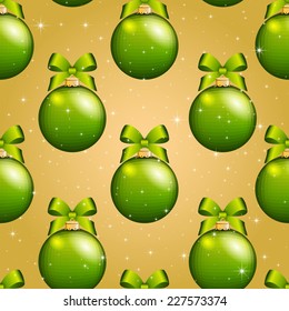 New Year ball pattern. Christmas wallpaper with bow and ribbon. Seamless background. Xmas Decorations. Sparkles and bokeh. Shiny and glowing