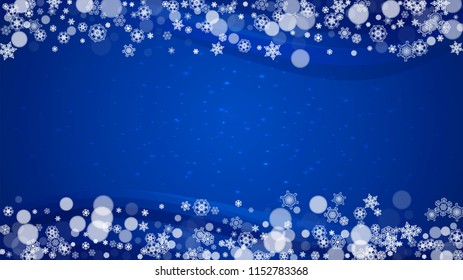 New Year border on blue background. Horizontal winter theme. Christmas and New Year border with snowflakes  falling. For season sales, special offer, banners, cards, party invites, flyers. White snow