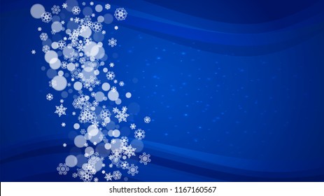 New Year border on blue background. Horizontal winter theme. Christmas and New Year border with snowflakes  falling. For season sales, special offer, banners, cards, party invites, flyers. White snow