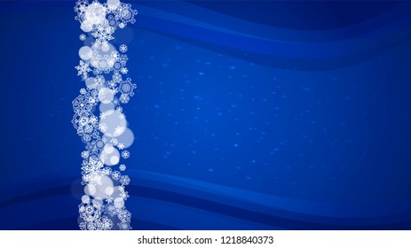 New Year border on blue background. Horizontal winter theme. Christmas and New Year border with snowflakes  falling. For season sales, special offer, banners, cards, party invites, flyers. White snow