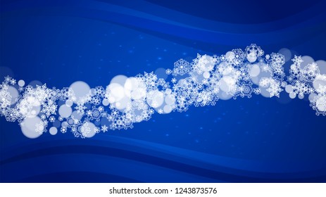 New Year border on blue background. Horizontal winter theme. Christmas and New Year border with snowflakes  falling. For season sales, special offer, banners, cards, party invites, flyers. White snow