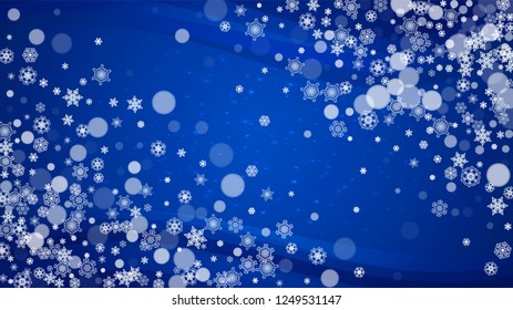 New Year border on blue background. Horizontal winter theme. Christmas and New Year border with snowflakes  falling. For season sales, special offer, banners, cards, party invites, flyers. White snow