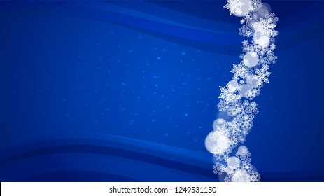 New Year border on blue background. Horizontal winter theme. Christmas and New Year border with snowflakes  falling. For season sales, special offer, banners, cards, party invites, flyers. White snow