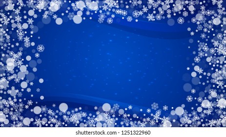New Year border on blue background. Horizontal winter theme. Christmas and New Year border with snowflakes  falling. For season sales, special offer, banners, cards, party invites, flyers. White snow