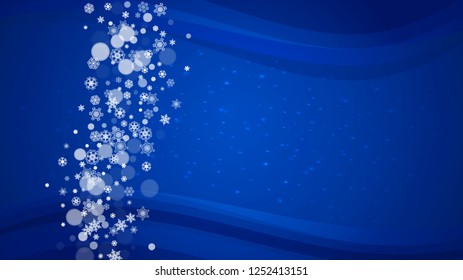 New Year border on blue background. Horizontal winter theme. Christmas and New Year border with snowflakes  falling. For season sales, special offer, banners, cards, party invites, flyers. White snow