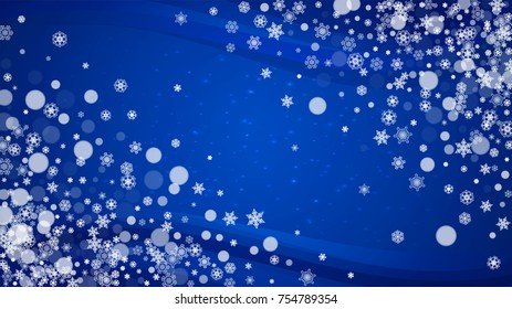 New Year border on blue background. Horizontal winter theme. Christmas and New Year border with snowflakes  falling. For season sales, special offer, banners, cards, party invites, flyers. White snow