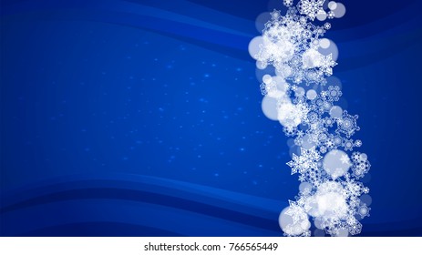 New Year border on blue background. Horizontal winter theme. Christmas and New Year border with snowflakes  falling. For season sales, special offer, banners, cards, party invites, flyers. White snow