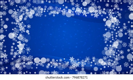 New Year border on blue background. Horizontal winter theme. Christmas and New Year border with snowflakes  falling. For season sales, special offer, banners, cards, party invites, flyers. White snow