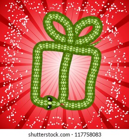 New Year card with a cute snake (symbol of 2013 year) in shape of a gift box
