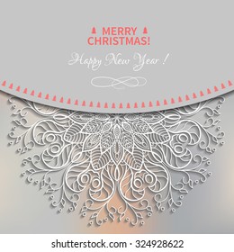 New Year card from white snowflake circular ornament cut from paper