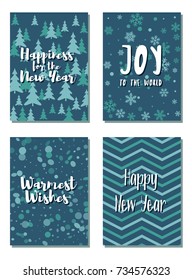 New Year cards set with Joy to the World and Warmest Wishes text. Holiday postcards, banners design collection. Greeting New Year cards vector templates set with wishes of joy and warmest greetings.