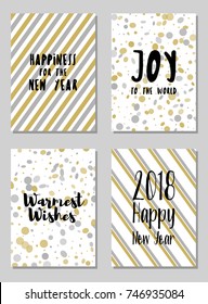 New Year cards set with Joy to the World and Warmest Wishes text. Holiday postcards, banners design collection. Greeting New Year cards vector templates set with wishes of joy and warmest greetings.