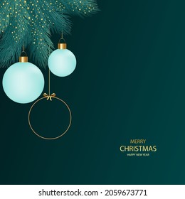 New Year and Christmas background. Branches of a Christmas tree with Christmas balls on a dark background.