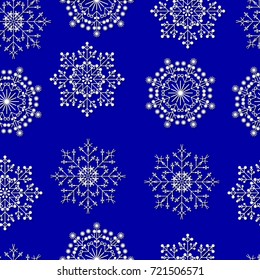 New year and christmas background. White cut out 3d snowflakes on blue background. New Year and Christmas design of greeting card, background, invitation, web site, billboard. Seamless pattern.