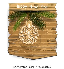New Year or Christmas banner with Christmas-tree patterned ball and branches of spruce on a wooden panel. Isolated element on white background.