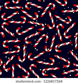 New Year and Christmas seamless pattern with a sweet cane and snowflakes on a dark background.Bright color background for the winter cards, paper wrapper and other objects. Hand drawing vector illustr