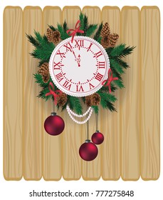 New Year clock, decorated with balls, twigs and beads on the background of a wooden texture of the boards