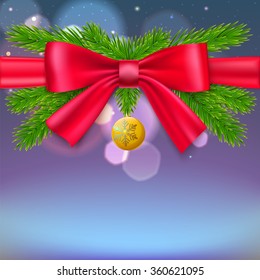 New year composition with bow, fir branches and Christmas ball on blurred background