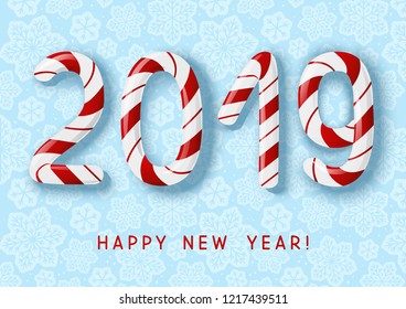 New Year concept - 2019 candy numbers on blue