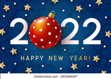 New Year concept - 2022 numbers with Christmas ball and starry decor on blue snowflakes background for winter holidays design