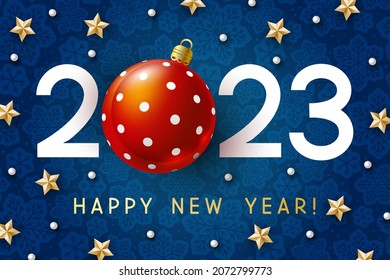 Concepto de Año Nuevo - números del 2023 con decoración estelar y bola de Navidad con fondo de copos de nieve azul para el diseño de las vacaciones de invierno