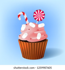 New Year cupcake with pink cream, candies and marshmallows on a color gradient background