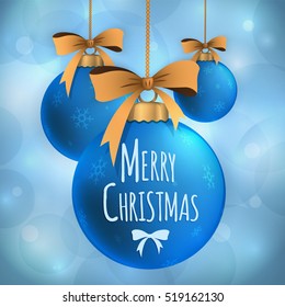 New year decoration. Blue ball with yellow bow. Merry Christmas.