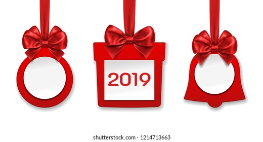 New year decorations made of paper. Christmas jingle bells and gift or present, ball toy with bow knots for xmas fir tree tree. 2019 holiday and celebration ornaments, winter festive.