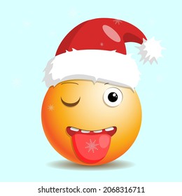 New Year emoji with a santa hat and a snowflake on the tongue.