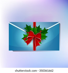 new year envelope with a piece of candy and a Christmas sprig 