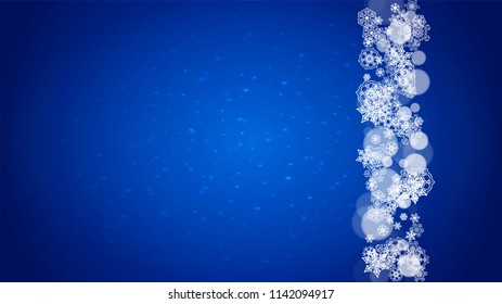 New Year frame with cold snowflakes on blue horizontal background with sparkles. Christmas and New Year frame for gift certificates, ads, banners, flyers, sales offers, event invitations. Falling snow