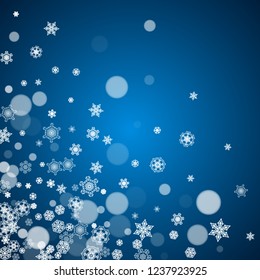 New Year frame with cold snowflakes on blue background. Winter window. Christmas and New Year frame for gift certificates, ads, banners, flyers, sales offers, event invitations. Falling snow and bokeh