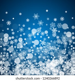 New Year frame with cold snowflakes on blue background. Winter window. Christmas and New Year frame for gift certificates, ads, banners, flyers, sales offers, event invitations. Falling snow and bokeh
