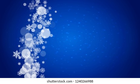 New Year frame with cold snowflakes on blue horizontal background with sparkles. Christmas and New Year frame for gift certificates, ads, banners, flyers, sales offers, event invitations. Falling snow
