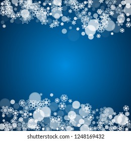 New Year frame with cold snowflakes on blue background. Winter window. Christmas and New Year frame for gift certificates, ads, banners, flyers, sales offers, event invitations. Falling snow and bokeh