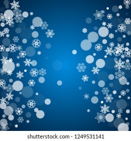 New Year frame with cold snowflakes on blue background. Winter window. Christmas and New Year frame for gift certificates, ads, banners, flyers, sales offers, event invitations. Falling snow and bokeh