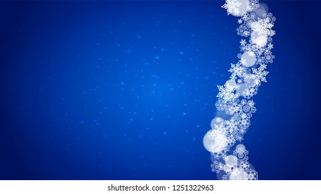 New Year frame with cold snowflakes on blue horizontal background with sparkles. Christmas and New Year frame for gift certificates, ads, banners, flyers, sales offers, event invitations. Falling snow