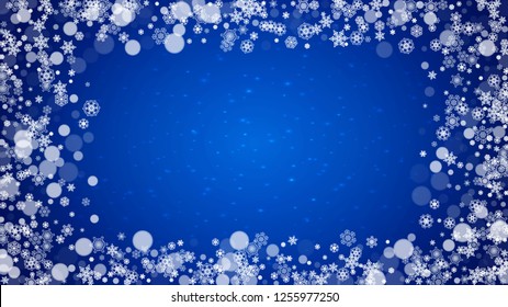 New Year frame with cold snowflakes on blue horizontal background with sparkles. Christmas and New Year frame for gift certificates, ads, banners, flyers, sales offers, event invitations. Falling snow