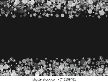 New Year frame with cold snowflakes on black horizontal background. Christmas and New Year frame for gift certificates, ads, banners, flyers, sales offers, event invitations. Falling snow and bokeh